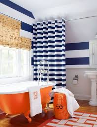 Orange is a daring color to be sure, but it can also be a wonderful canvas for playing with even more daring shapes and textures throughout the room. 23 Genius Ways To Cheer Up Your Bathroom Orange Bathroom Walls Orange Bathrooms Orange Bathroom Decor