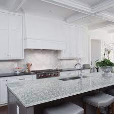 Antique white kitchen cabinets with black granite countertops. Perfect White Granite Kitchen Countertops For Every Style