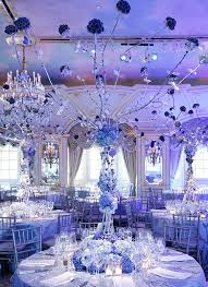 Winter Wonderland Wedding Reception Decor With High Floral Topiari Winter Wonderland Wedding Reception Blue Wedding Centerpieces Winter Wonderland Centerpieces