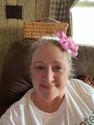 Ann Marston stringing her bow at a Sports Illustrated exposition***