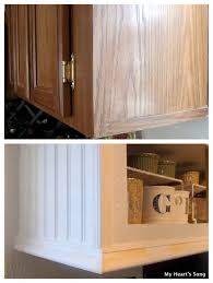 My Heart S Song Kitchen Makeover Phase Two Beadboard On End Caps Of Newly Painted Cupboard Kitchen Cabinets Trim Remodeling Mobile Homes Kitchen Makeover