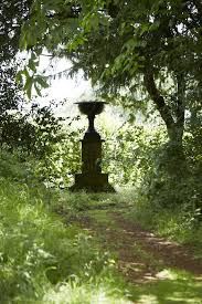 Landscaping with Antiques: 8 Design Ideas for Urns and Planters