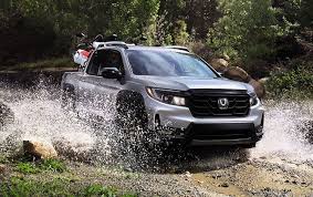 Power central locking system with safety unlock feature if airbags deploy . 2022 Honda Ridgeline Vs Competition Honda