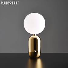 By now you already know that, whatever you are looking for, you're sure to find it on aliexpress. Meerosee Nordic Post Modern Polished Iron Table Lamp Glass Ball Desk Lamp For Cafe Coffee Shop Decor Md85414 Buy Nordic Table Lamp Post Modern Table Lamp Nordic Desk Lamp Product On Alibaba Com