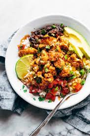 Black Beans Or Pinto Beans In Burrito Roasted Cauliflower Burrito Bowls Recipe Vegan Dinners Healthy Recipes Food Recipes