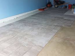 Our New White And Gray Porcelain Tile Garage Floor Installation Tile Floor Garage Tile Garage Floor Tiles
