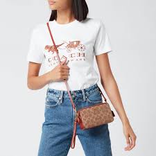 This coach kira bag absolutely fits the bill. Coach Canvas Colorblock Signature Kira Cross Body Bag Lyst