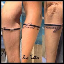 Yazi Kol Izmir Dovme Piercing Alsancak Dip Tattoo Geometrik Realistic Portre Mikrodermal Anchor Piercing Arm Band Tattoo Band Tattoo Designs Tattoos