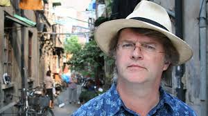Trying to suppress her giggles, suki splutters: Paul Merton In China Tiger Aspect Productions