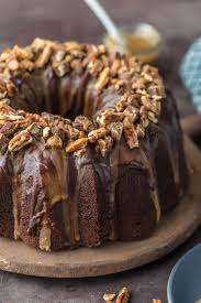 This Turtle Brownie Cake Is A Chocolate Lovers Dream Dense And Moist Chocolate Cake With Wal Brownie Cake Recipe Chocolate Brownie Cake Chocolate Turtle Cakes
