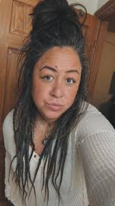 Looking for someone to install dread extensions into hair.