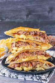 Pulled Pork Macaroni And Cheese Tortilla Wrap Hack Filling A Tortilla With Barbecue Pork Mac And Cheese In 2021 Pulled Pork Leftovers Recipes Pulled Pork Leftovers
