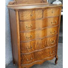The beauty of the tiger's eyes on furniture is enough to drive the sale of anything made from tiger oak upwards. 1900s Antique American Tiger Oak Tall Serpentine Highboy With Mirror Chairish