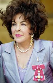 Elizabeth: Dame Commander of the British Empire, 2000 by Andrew Garth, via  Flickr.Wearing her earrings she designed for the ceremony, having them  crafted by Van Cleef and Aprels.