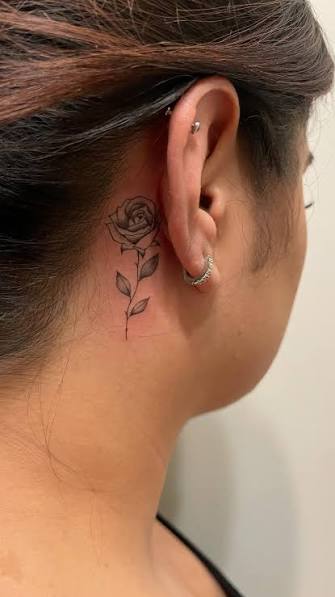 Rose behind the ear tattoo, ., ., ., Dm to book (include the following):, ✅Name, ✅Age, ✅A description and photo of the tattoo what you want, ✅Size of the tattoo, ✅Placement of the tattoo, ✅black/ ...