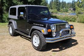 Image result for Brilliant Black 2005 Jeep