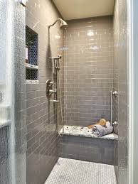 The gray tones in cement tiles provide the right amount of contrast when paired with the natural variation of stone. Contemporary Gray Bath Powell Construction