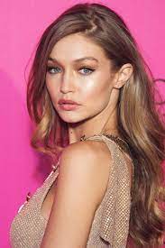 It's a classic hair colour that creates a solid, not flat, natural brunette shade. Every Gigi Hadid Beauty Look Fulfills These 5 Qualities Dark Blonde Hair Gigi Hadid Hair Color Gigi Hadid Hair