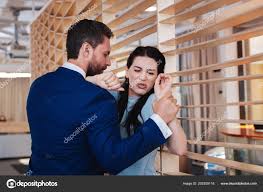 Lustful man seducing a woman at work Stock Photo by ©yacobchuk1 202259118
