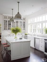 Distinguished by their exposed front that drops down to the cabinet below rather than stopping at the countertop edge, apron sinks are available in a variety of materials. 19 Inspiring Farmhouse Kitchen Sink Ideas Architectural Digest