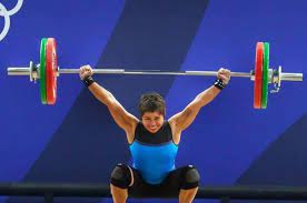 Hidilyn diaz reacts emotionally after successfully lifting her final attempt at the group a women's 55 kg weightlifting event in the 2020 tokyo olympics in the tokyo international forum in japan on monday. 4jkmy1tc8 Ph7m