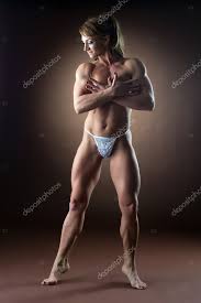 Strong woman body builder walk side Stock Photo by ©Wisky 10155623