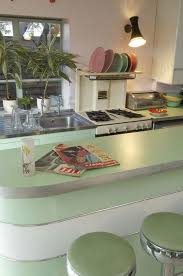 modern 1950s kitchen with mint green