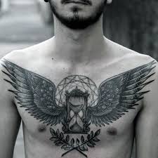 Top 39 Wing Chest Tattoo Ideas 2021 Inspiration Guide Chest Tattoo Men Chest Tattoo Wings Tattoo Designs Men