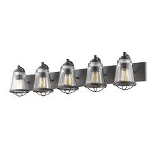 Constructed of formed steel with clear outer glass, this light features inner white glass for a traditional touch. Avery Home Lighting Mariner Bronze 5 Light Vanity Overstock 14463677
