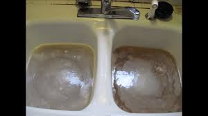 clear a clogged kitchen sink drain