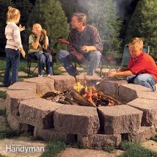 How to build a firepit with castlewall block. How To Build A Stone Fire Pit Ring Diy Family Handyman