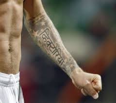David beckham showed of his new three lions tattoo and platinum blonde hair as he relaxed on a yacht in capri. Unique Top 10 David Beckham Tattoo Pictures David Beckham Tattoos Celebrity Tattoos David Beckham
