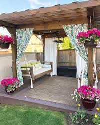 This meant the patio cover could start at the edge of the house's roof at a height of eight feet and slope down to seven feet, leaving a clearance of more than six and a half feet between the lowest part of the frame's headers and the ground at its outer edge. 24 Cheap Backyard Makeover Ideas You Ll Love Extra Space Storage