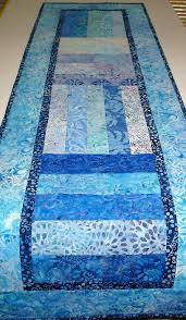 Batik Table Runner In Aqua Blue Violet Batiks Handmade Quilted Pieced By Picketfencefabric Batik Table Runners Quilted Table Runners Quilted Table Toppers