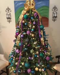 See other peacock and bird embellishments that adorn the tree, including; Muffin Top Confections On Instagram Loving Our Peacock Themed Christmas Tree This Year If You L Peacock Christmas Christmas Favorites Christmas Tree Themes