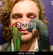 Dagger (Khanjar), Indian, Mughal, 19th century, Indian, Mughal, Steel,  jade, gold, ruby, emerald, beryl, rock crystal, turquoise, H. 14 in. (35.6  cm); H. of blade 9 1/8 in. (23.2 cm); W. 3