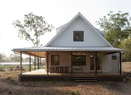 Inspired Wrap Around Porch Technique Austin Farmhouse Exterior Decorating Ideas With Black Window Tr Modern Farmhouse Exterior House With Porch Pole Barn Homes