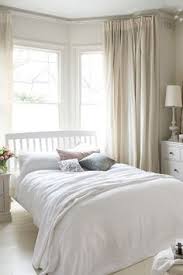 It often happens that the size of the bedroom is on the small side to arrange a seating and those who have a bow casement can create the most. Serene Cream Bedroom Furniture Layout Bedroom Window Design Bedroom Layouts