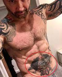 Here's the last in this series of videos, designed for those who enjoyed professional wresting. Dave Bautista S 33 Tattoos Their Meanings Body Art Guru