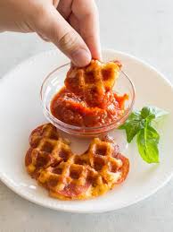 If you want to make these pepperoni pizza chaffles for your new year's party, it's easy to make multiple batches in advance and then add the topping and broil just before serving. Pizza Chaffle The Girl Who Ate Everything
