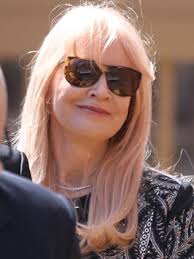 Daughter, widow fight for TV king's estate