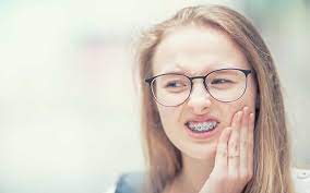 Home Remedies To Soothe Pain From Braces | Absolute Dental