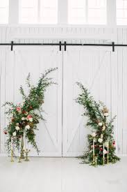 Maybe you would like to learn more about one of these? Barn Wedding Decor Inspiration With Sliding Barn Doors As Backdrop Tall Greenery Florals In Gol Wedding Ceremony Decorations Barn Ceremony Ceremony Backdrop
