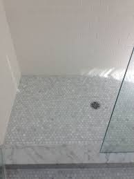 With expertly rounded or beveled edges, this tile threshold piece offers a seamless transition from your shower pan, kitchen, bathroom or fireplace area. Sparrow Builders Inc Bathroom Remodel Seattle Wa Subway Tile Honed Carrara Marble Floor Slab Marble Shower Cu Shower Curb Marble Showers Shower Tile