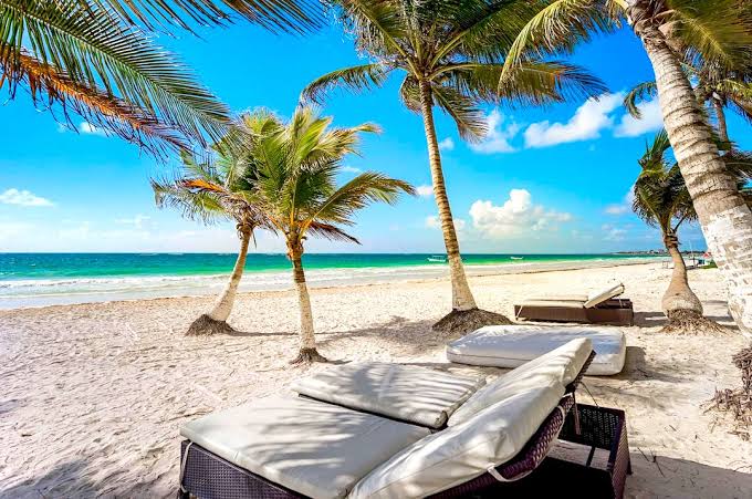 A tropical beachfront in the Riviera Maya, AI generated