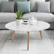 Carmen solid oak coffee table with drawers solid oak coffee tables in hertford. Carson Carrington Tangeberg 31 Inch Round Marble Coffee Table With Oak Legs On Sale Overstock 29749278