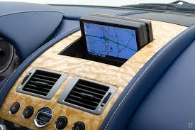 Image result for Midnight Blue 2010 Aston Martin