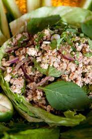 Nyt Cooking Larb Gai Is A Dish Of Chopped Chicken Mint Basil And Red Onions Dressed With Lime Juice And Ground Red Chili Fresh Herb Recipes Larb Gai Recipes