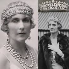 Queen Victoria's Strawberry Leaf Tiara was originally designed as a band of  diamond and rubies topped with 14 diamond lozenge shape clusters and 13  strawberry leaves. It was accompanied by a necklace,