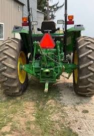 John Deere 6403 2WD Tractor, Open Station, 563 Hours, Roll Bar, 3x3 9 Speed  Transmission, 2 Aux., 3p - Maring Auction Co LLC